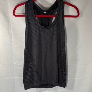 Athleta Black Striped Women's Tank Top I believe it’s a size medium pit topit 16
